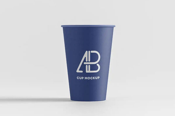 Mockup of a Paper Cup placed on a Solid Background FREE PSD