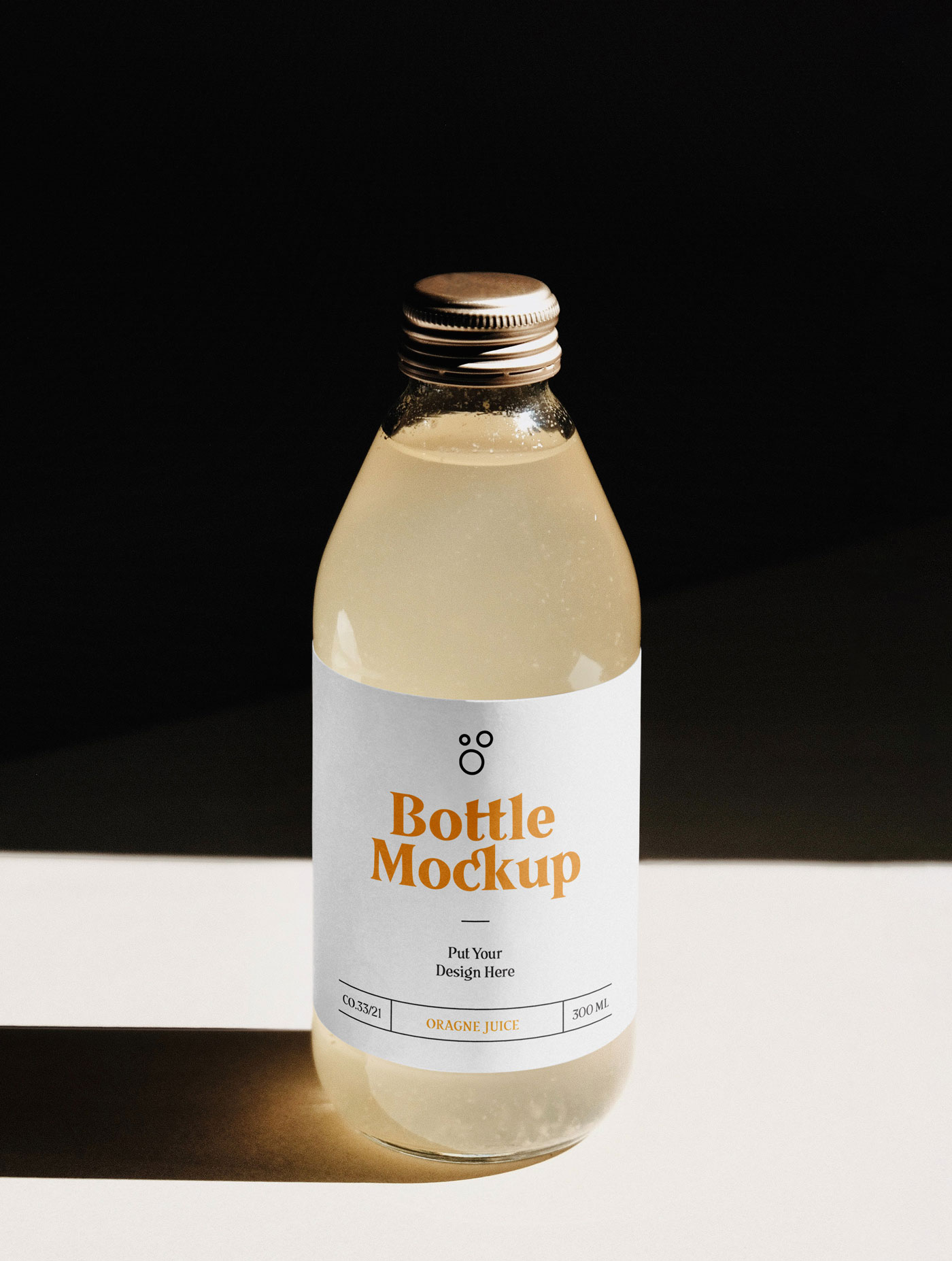 Free Glass Bottle Juice Mockup (PSD)