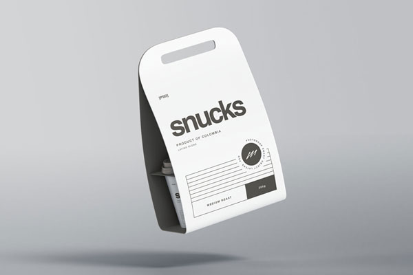 a-slightly-visible-coffee-cup-inside-a-cardboard-packaging-bag-mockup FREE PSD