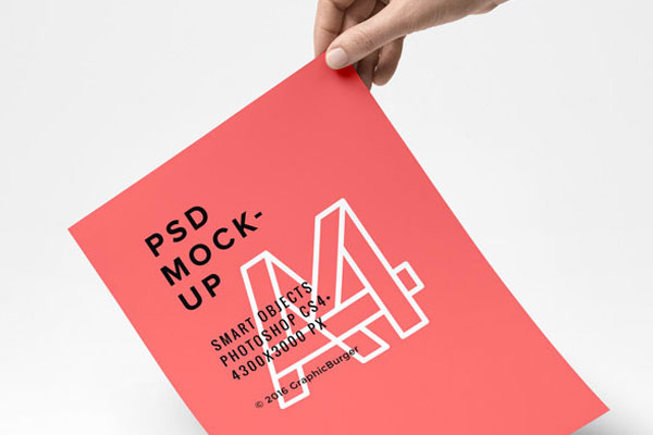 A4 Flyer Paper in a Hand Freebie Mockup FREE PSD