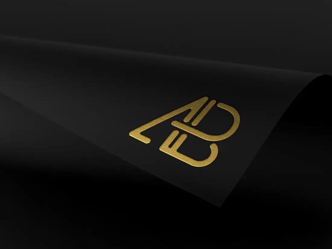 Gold, Silver, and Broonze Logo on Dark Foil Mockup FREE PSD