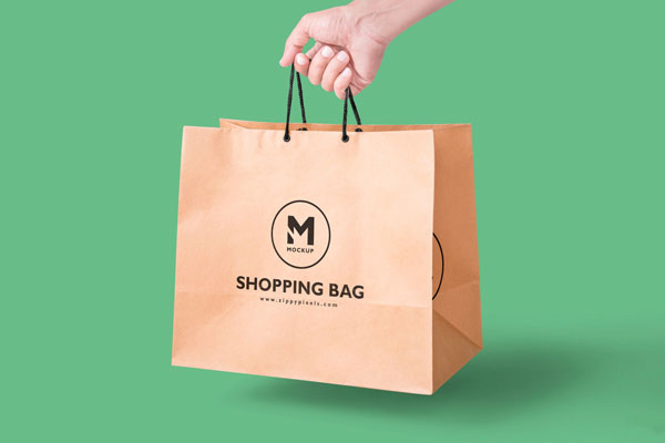 Handheld View of a Paper Bag Mockup FREE PSD
