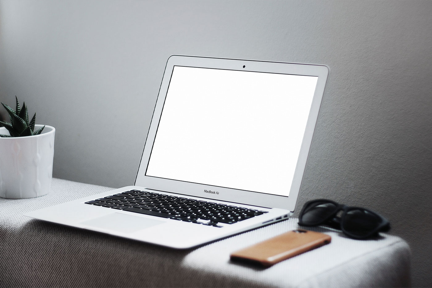 Interior View Of MacBook On Table With Related Items Mockup FREE PSD