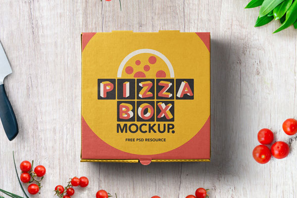 Mockup Displaying Top View of a Pizza Box on Wooden Surface beside Cherry Tomatoes FREE PSD