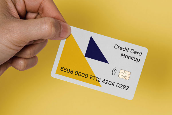 Mockup Featuring a Hand Holding a Credit Card FREE PSD