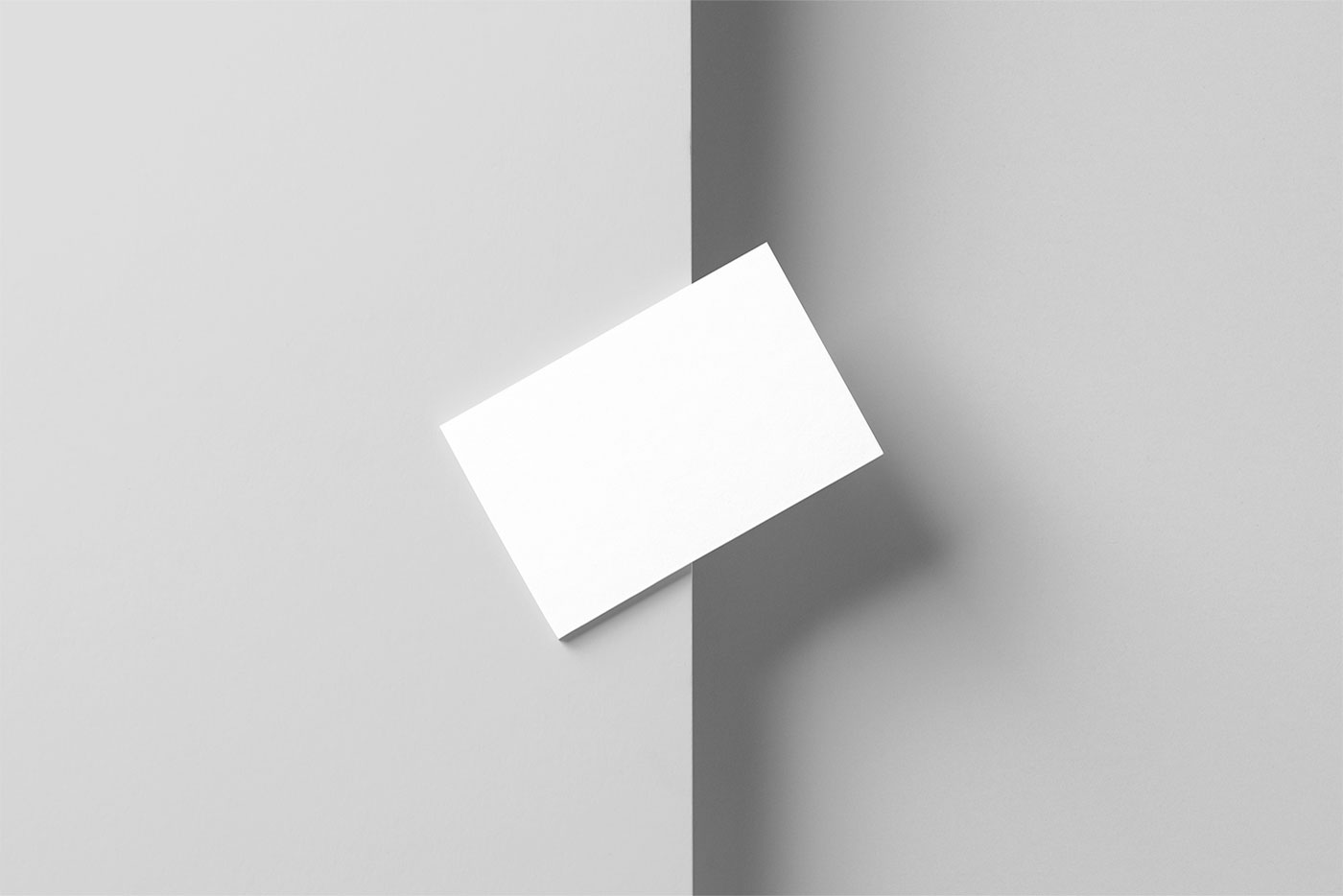 Mockup Featuring Top View of Tilted Business Card FREE PSD