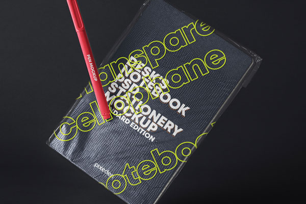 Mockup of a Notebook with Transparent Cover and a Pen FREE PSD