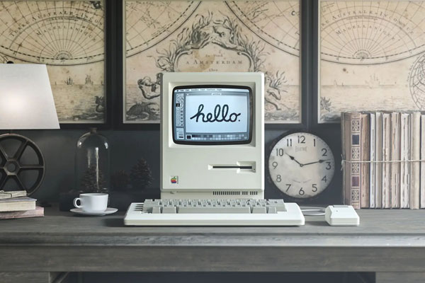 Mockup of a Vintage 1984 Apple Macintosh on a Desk FREE PSD