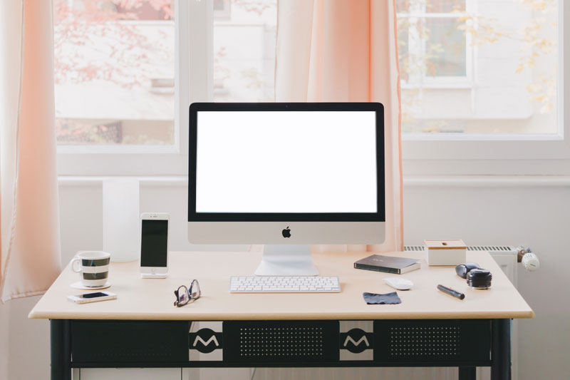Mockup of an iMac on a Desk in a Room FREE PSD