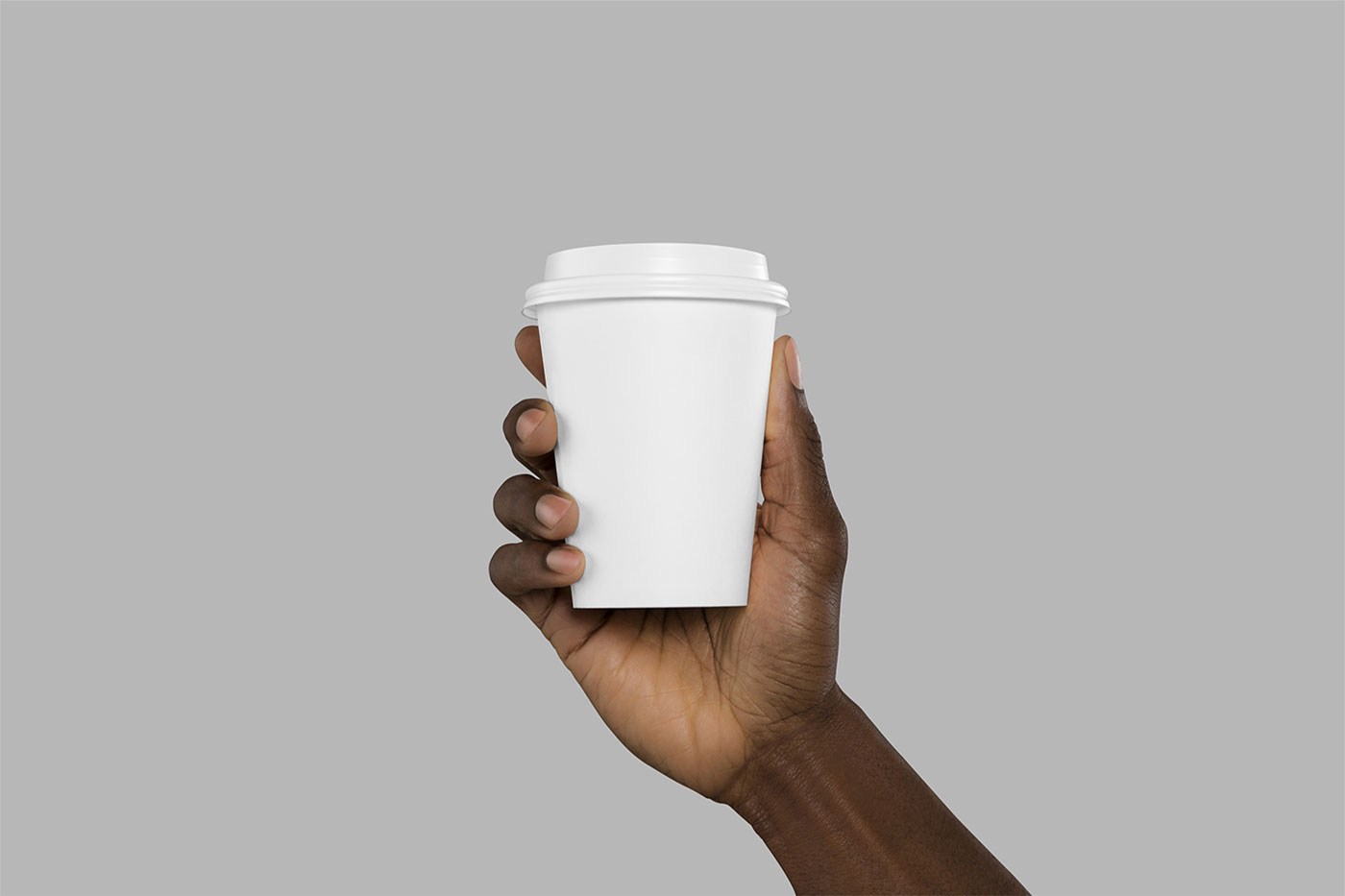 Mockup Showing Hand Holding Coffee Cup Wearing Lid FREE PSD