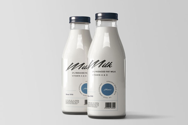 Two Shiny Glass Bottles Filled with Milk Mockup FREE PSD