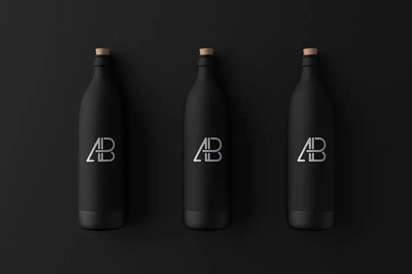 3 Matte Black Bottle Mockup On Dark Background FREE PSD
