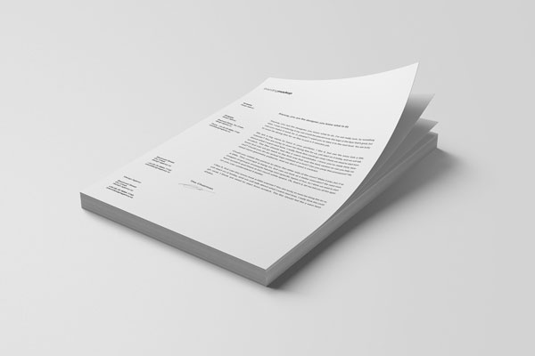 Mockup Showcasing an Open Folder Embedding a Letter Paper Brochure ...