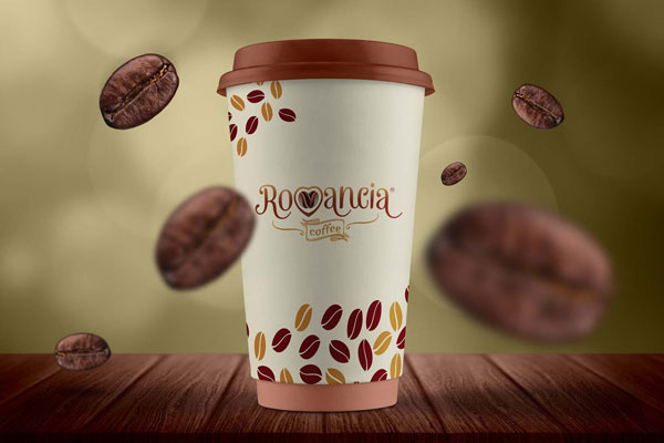 Coffee Cup On Wooden Surface With Floating Coffee Beans Mockup FREE PSD