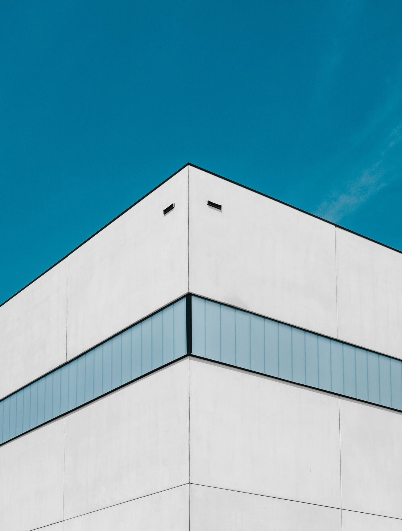 Corner View of Building with White Walls Mockup FREE PSD