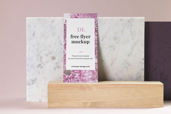 DL Flyer Standing on Wood Against the Marble Mockup FREE PSD