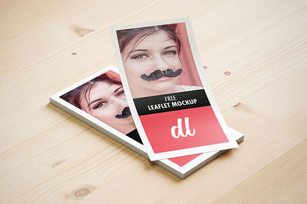 Dl Leaflet On A Wooden Surface Mockup FREE PSD