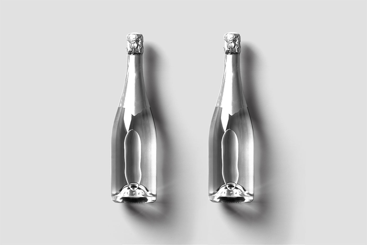 Front View of Two Champagne Bottles with Aluminum Foils Mockup FREE PSD
