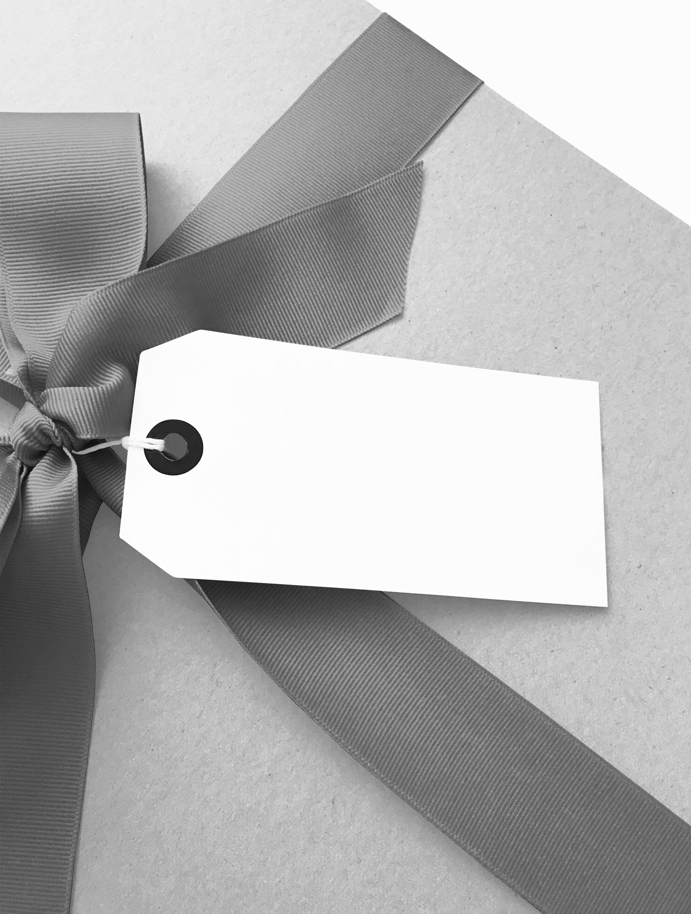 Gift Tag Mockup Attached to the Present Box Ribbon FREE PSD