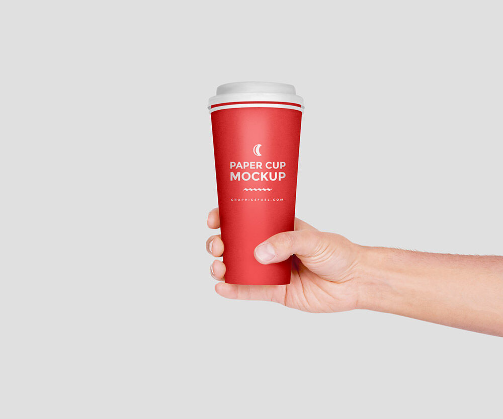 https://resourceboy.com/wp-content/uploads/2021/10/hand-holding-paper-coffee-cup-mockup-1.jpg