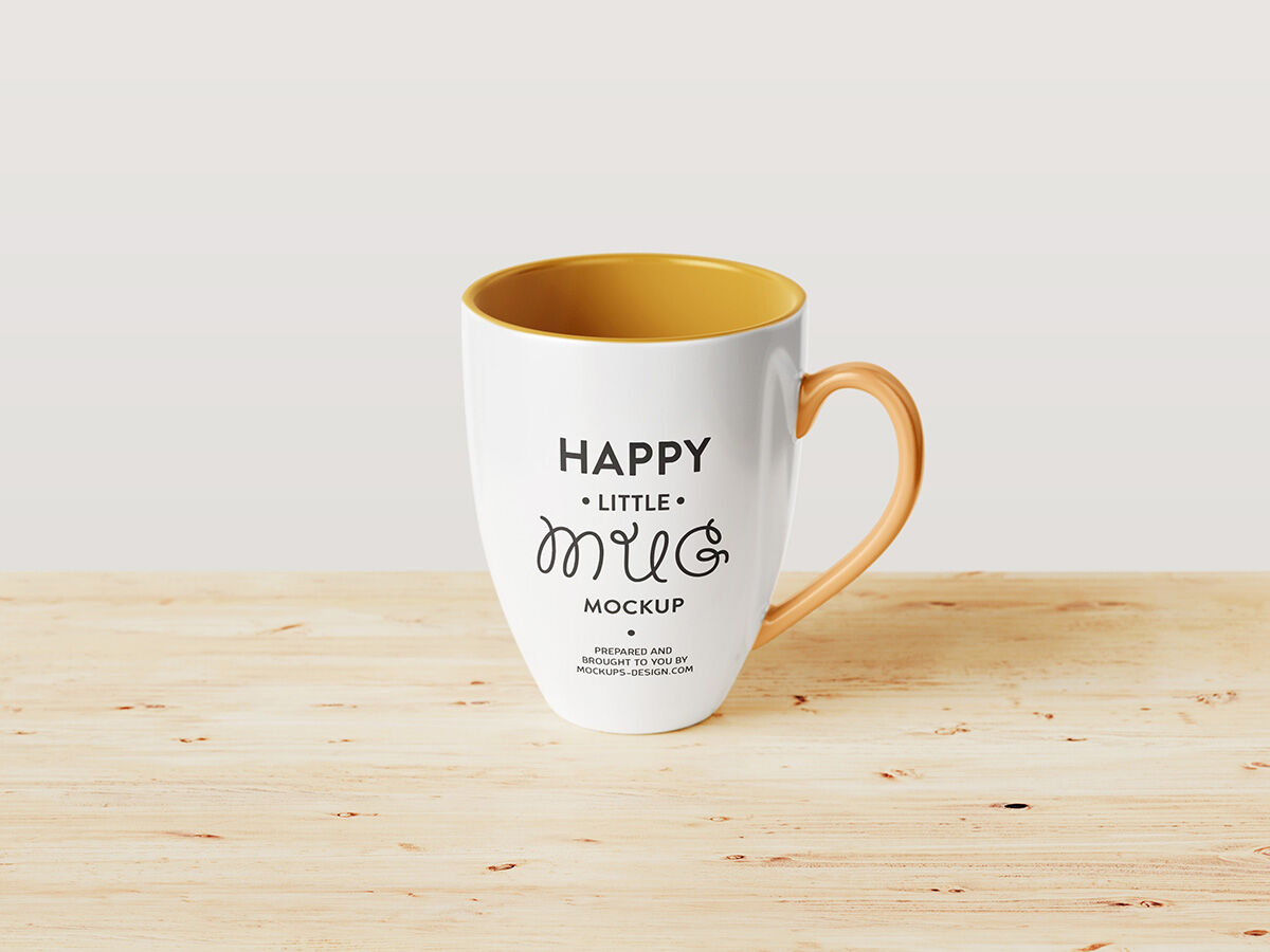 Laid-down Mug Mockup On A wooden Background FREE PSD