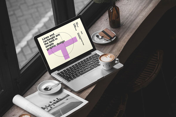 MacBook Pro In Cafe Environment Mockup FREE PSD