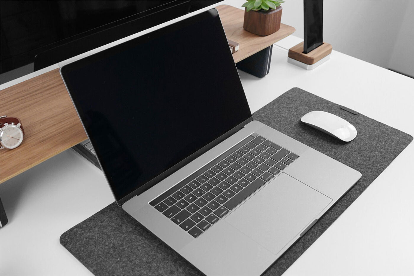 MacBook pro Side View On Table With Similar Items Mockup FREE PSD
