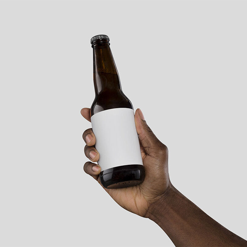 Mockup a Man's Hand Holding a Beer Bottle FREE PSD