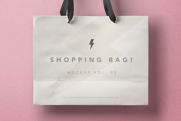 Mockup Displaying Big White Shopping Bag on a Pink Background FREE PSD