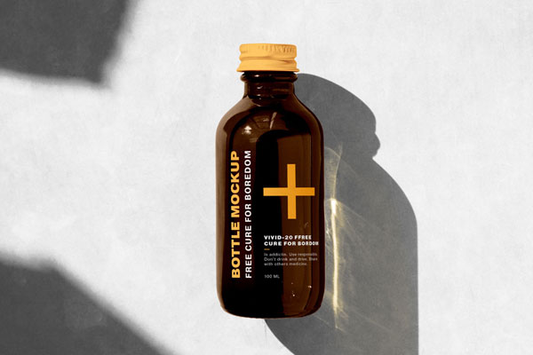 Mockup Displaying Front View of Glass Bottle with Shadows FREE PSD