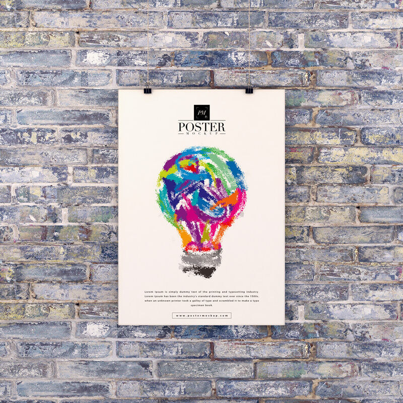 Mockup Displaying Poster Hanged over a Brick Wall FREE PSD