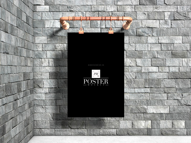 Mockup Displaying Poster Hanged over Stone Brick Wall in Indoor Setting FREE PSD