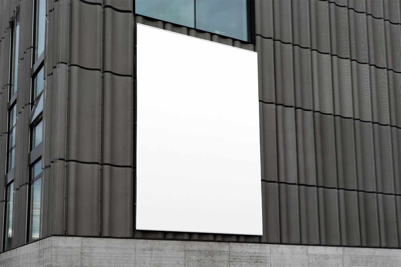 Mockup Displaying Vertical Billboard Mounted on a Building FREE PSD