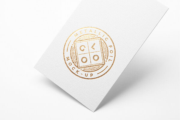 Mockup Featuring a color-customizable Metallic Foil Logo on a Sheet of Paper FREE PSD