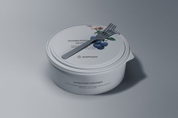 Mockup Featuring a Rounded Food Container with a Fork on top FREE PSD