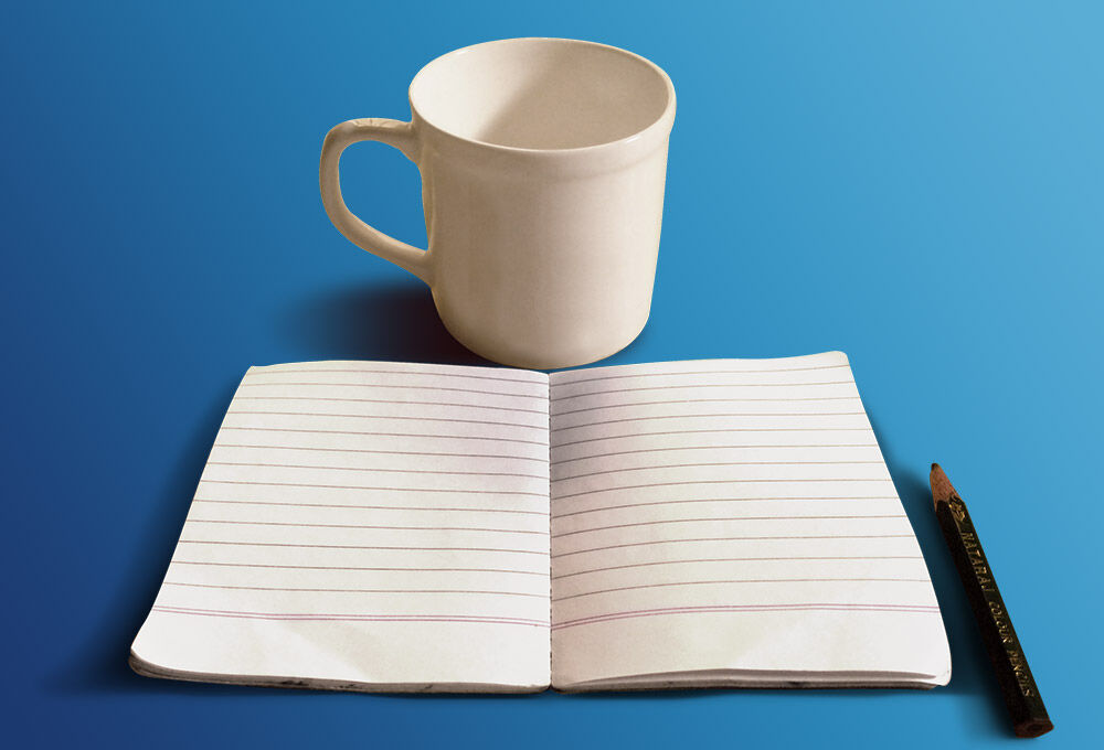 Mockup Featuring a Simple Mug and a Sketchbook FREE PSD