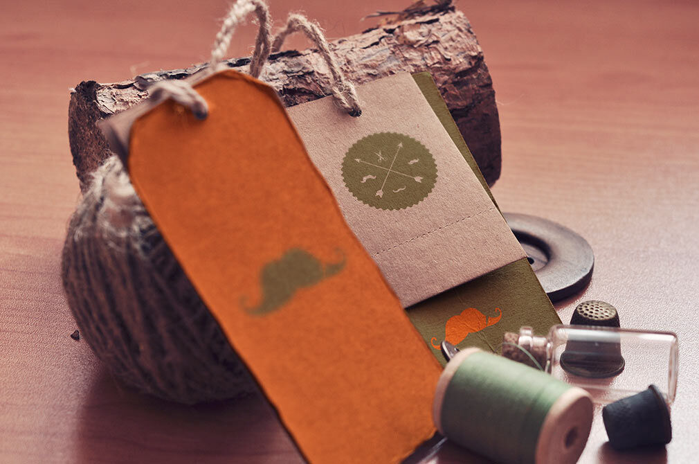 Mockup Featuring Four Vintage Scenes of Label Tags Decorated with Sewing Items FREE PSD