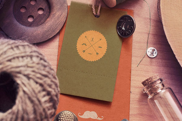 Mockup Featuring Four Vintage Scenes of Label Tags Decorated with Sewing Items FREE PSD