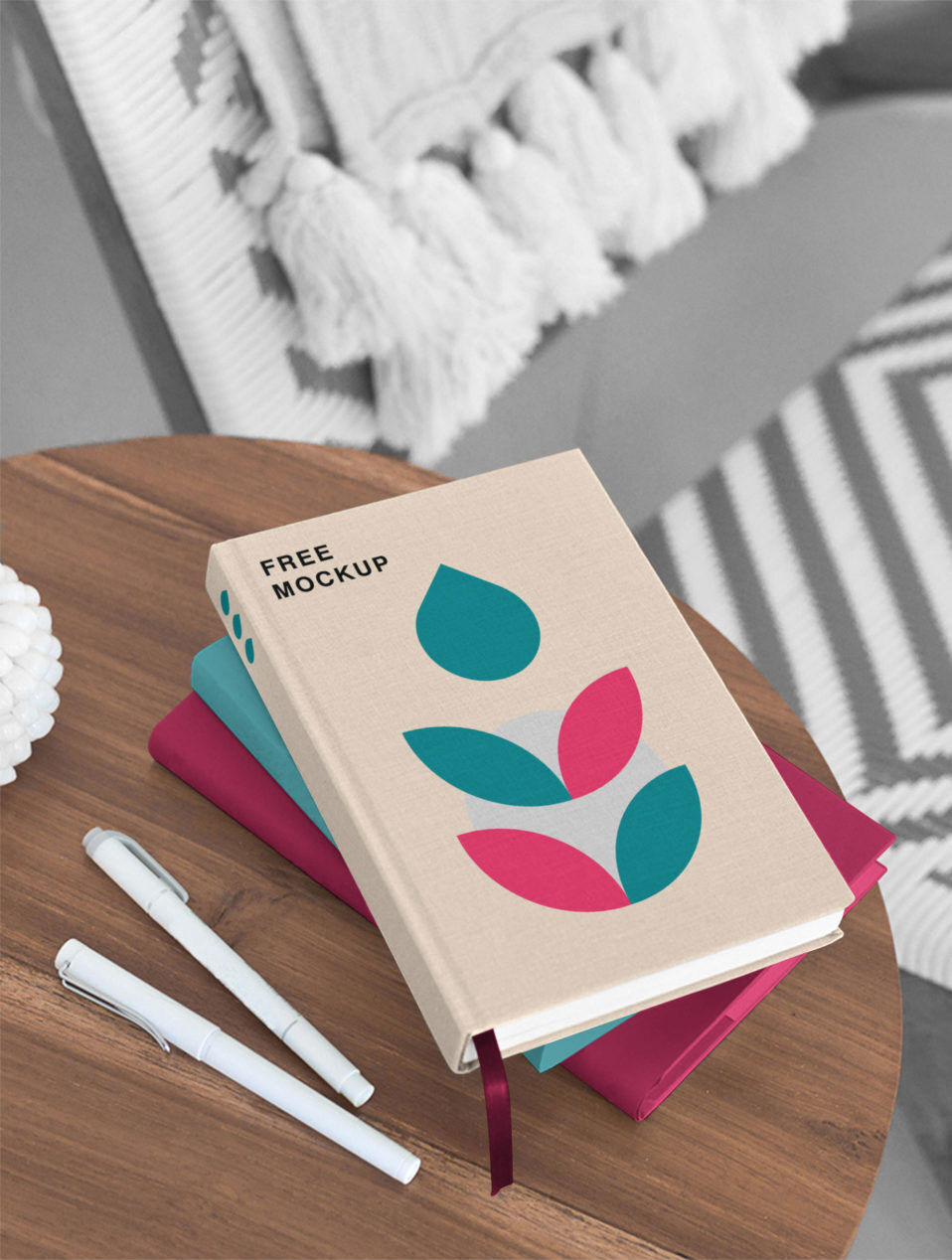 Mockup Featuring Three Hardcover Books on Wooden Table FREE PSD