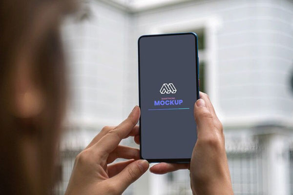 Mockup Featuring Woman Holding Smartphone FREE PSD