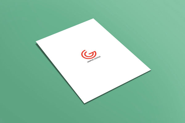 Mockup of a Flat A4 Flyer Laid on the Surface in Perspective FREE PSD