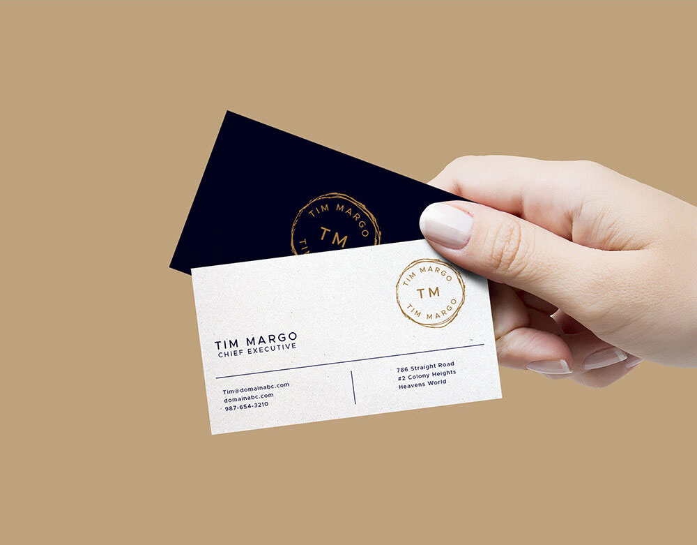 Mockup of a Hand Holding Two Business Cards FREE PSD
