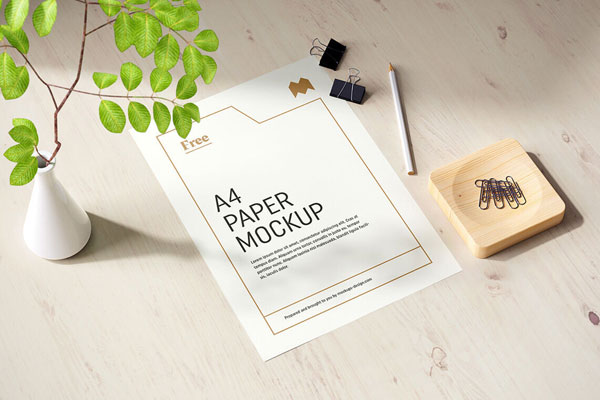 Mockup of an Elegant Paper Decorated with Greenery FREE PSD