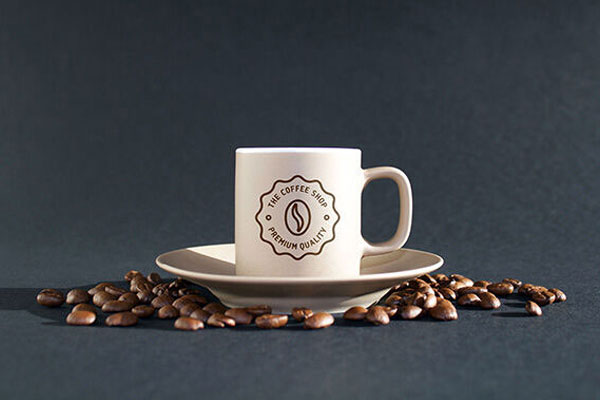 Mockup Showcasing Coffee Branding and Label on Cup and Sack FREE PSD