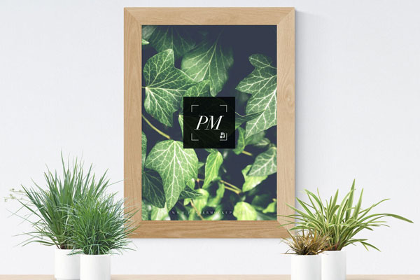 Mockup Showcasing Wooden Frame Poster and Vases FREE PSD