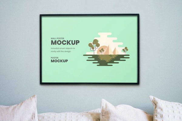 Mockup Showing a Poster Attached to a Wall and Decorated with Pillows FREE PSD