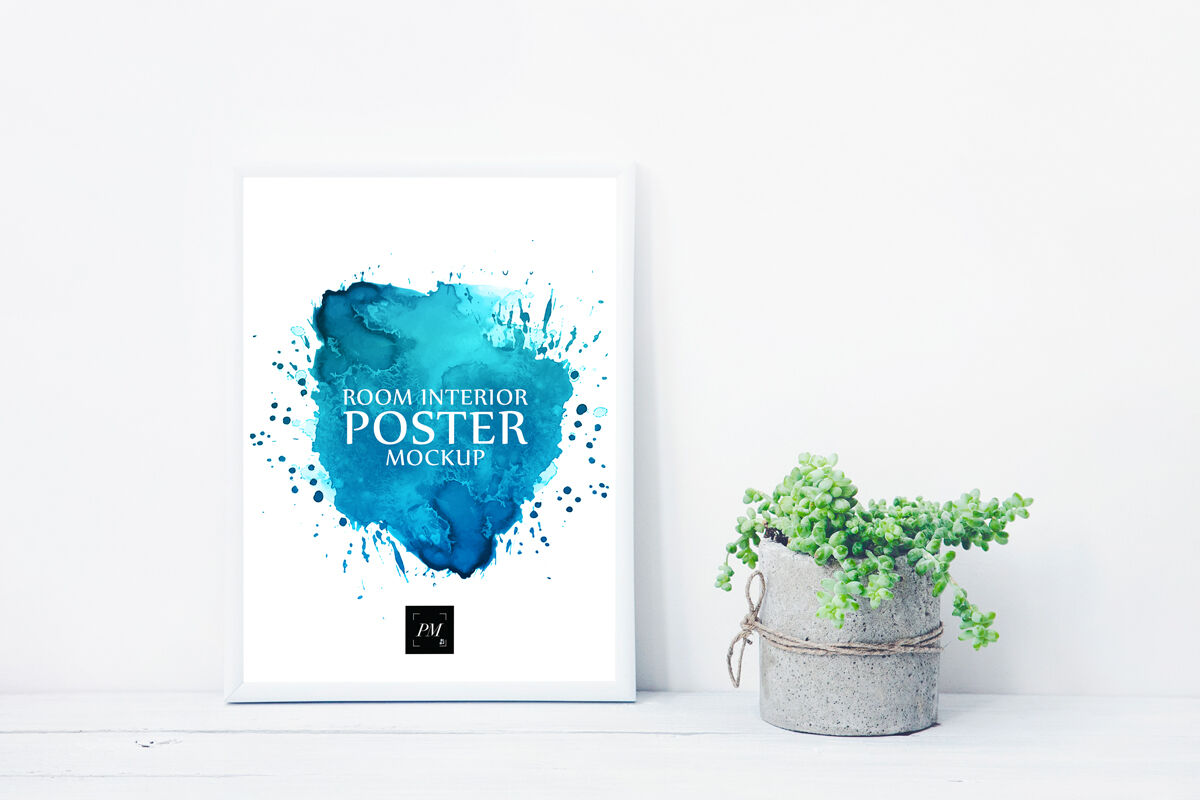 Mockup Showing Indoor Scene of Poster next to Concrete Vase FREE PSD