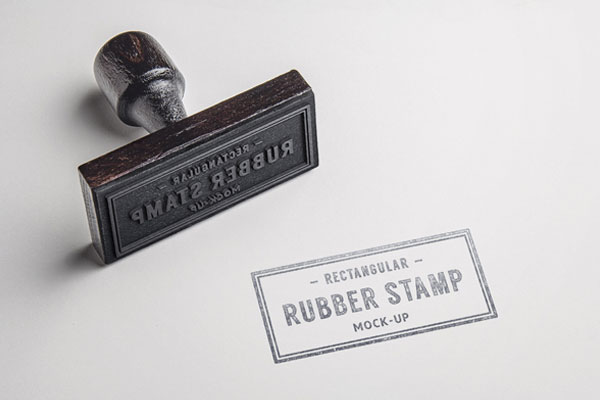 Mockup Showing Lying Rubber Stamp and Its Mark on Paper FREE