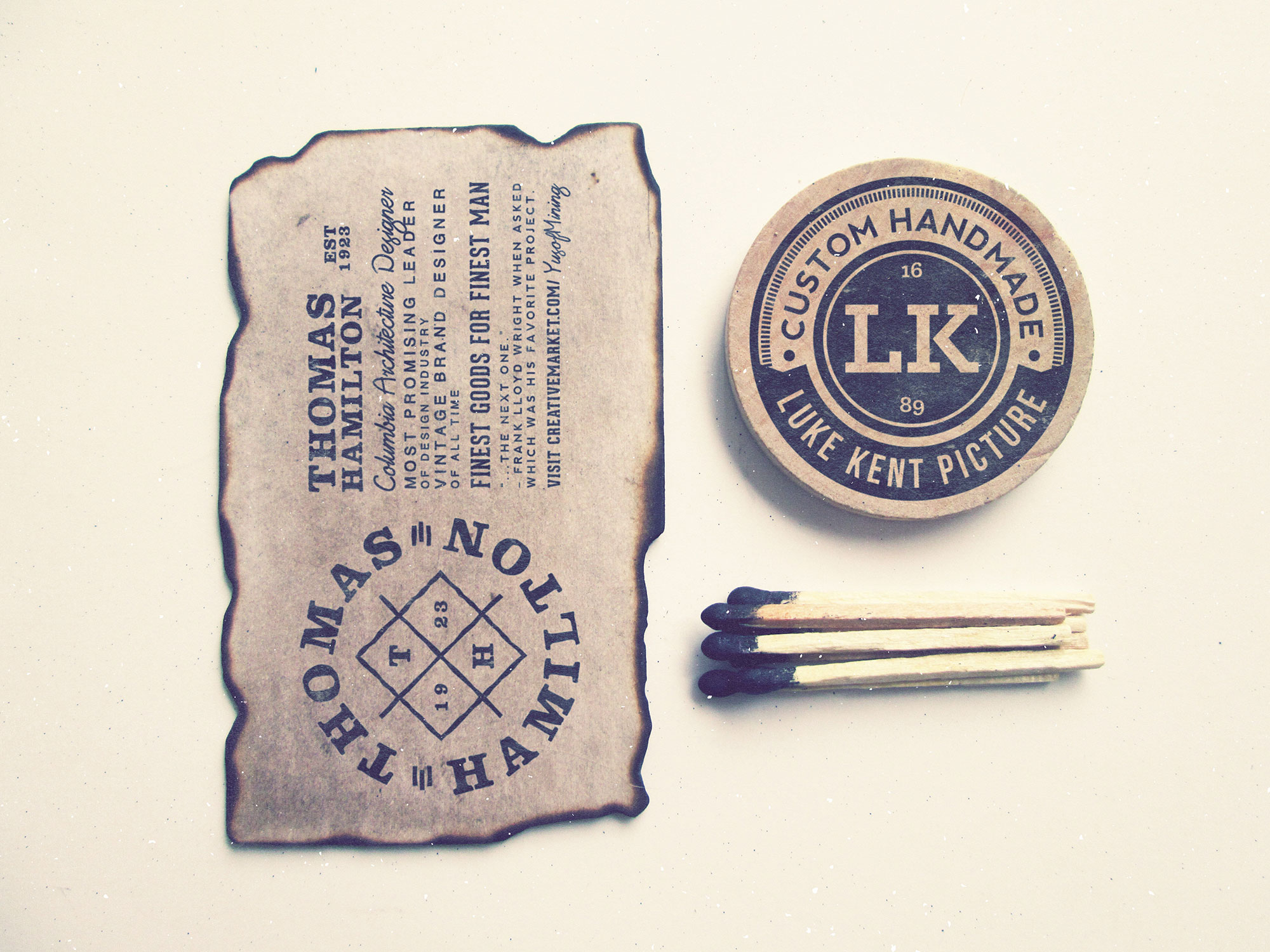 Mockup Showing Vintage Logo Scene with Burned Paper, Matches and Circle Object FREE PSD
