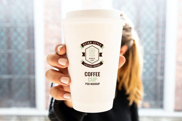 Mockup Showing Woman Holding Coffee Cup FREE PSD